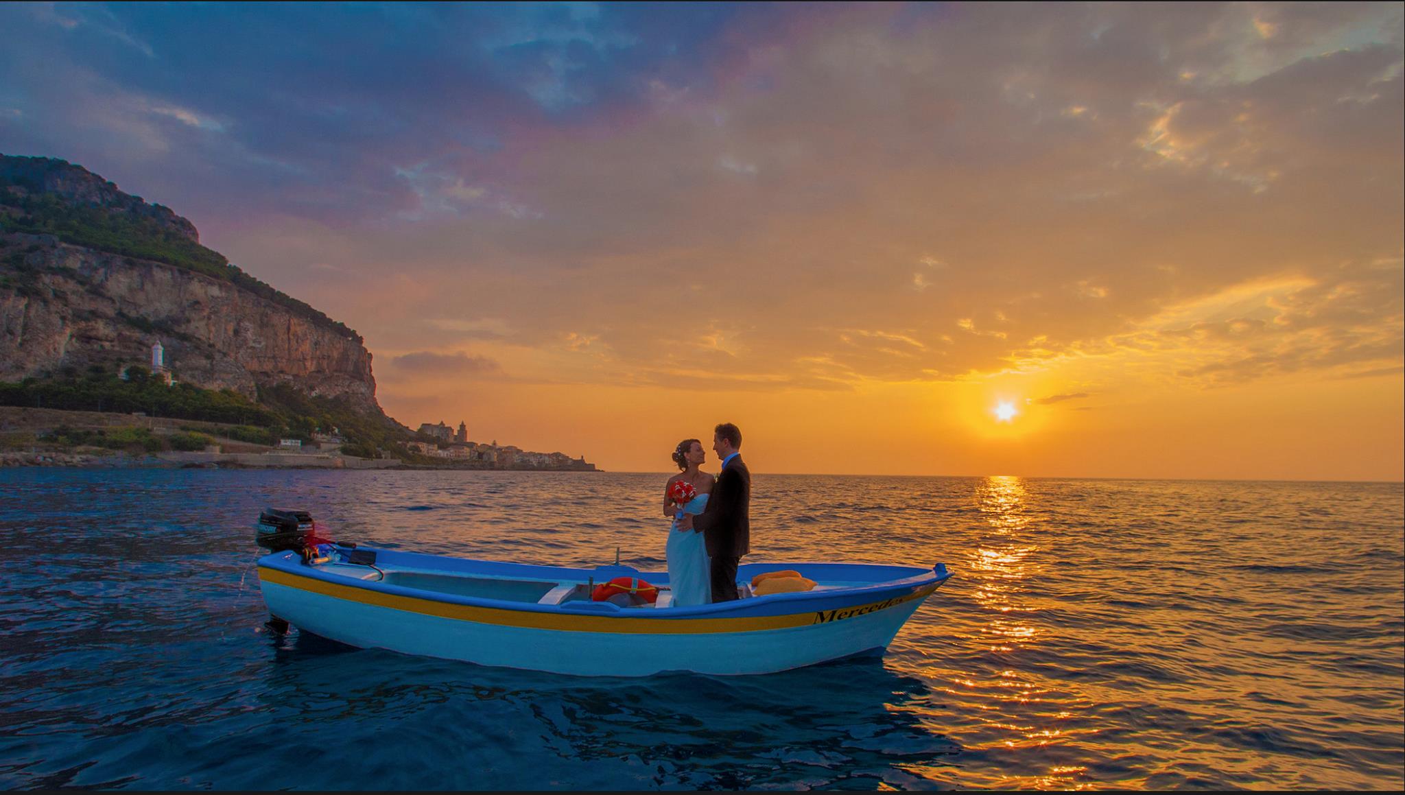 bride and groom in a fisherman boat